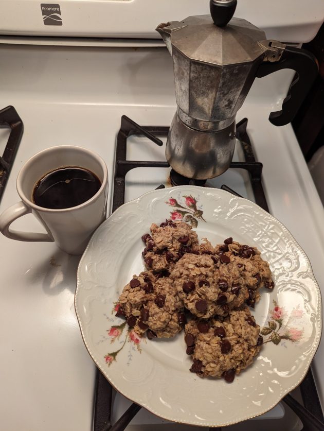 Mokka coffee cooker, a cup of barley coffee and a plate of baked vegan lactation cookies